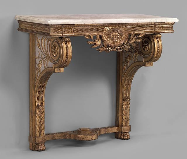 Marble and gilt oak console table with decoratively carved supporting brackets